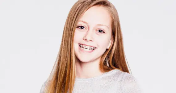 girl smiling with braces