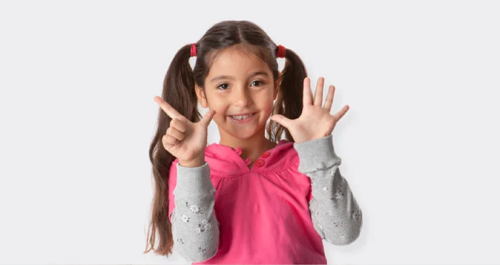 girl smiling with braces